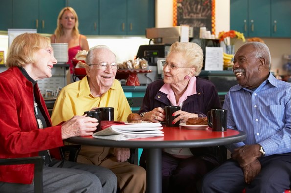 Elderly friends at a cafe