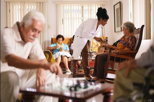 Elderly man playing chess