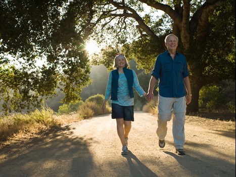 Elderly couple walking