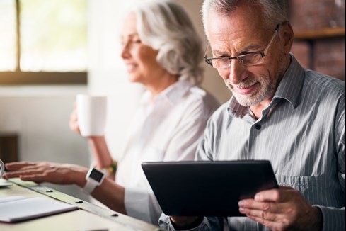 Elderly couple with technology