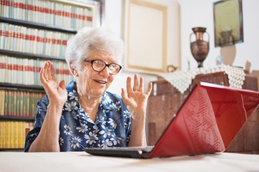 Elderly woman on laptop