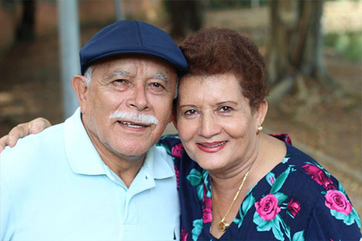 Hispanic couple smiling