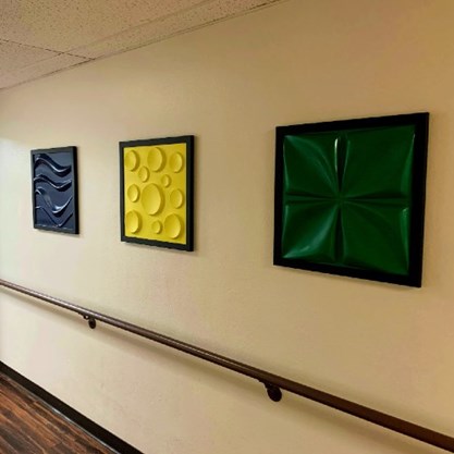 Tactile artwork in hallways for alzheimer's residents at the Oasis in Phoenix