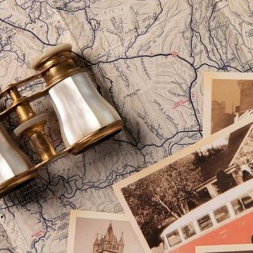 Photo of map and binoculars