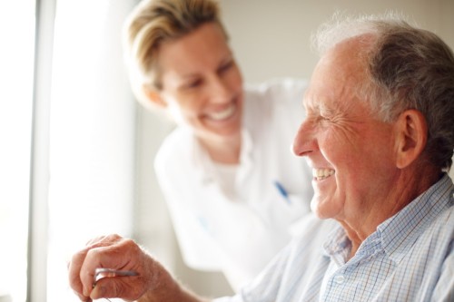 Senior gentleman with his caregiver at Fellowship Square Tucson