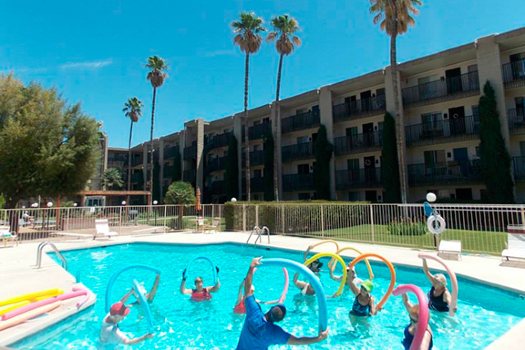 Photo of seniors doing water exercise at Fellowship Square independent living Tucson