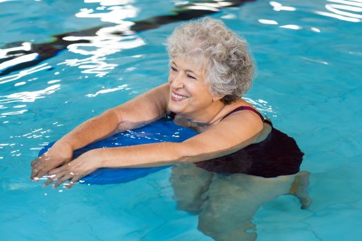 Photo of senior swimming at Fellowship Square Surprise Independent Living
