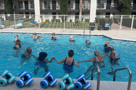 Photo of seniors taking water aerobics class at Fellowship Square Retirement Community in Tucson