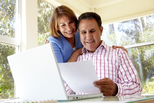 photo of couple viewing independent living costs at Fellowship Square Historic Mesa