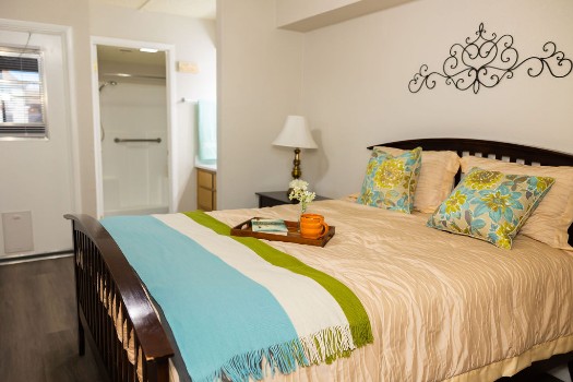 Photo of primary bedroom in 2 bedroom Independent Living apartment for seniors in Mesa